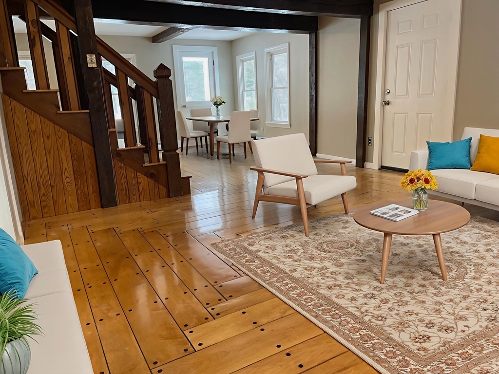 719 Mt Hermon Station Road Northfield, MA 01360 - Photo 15 of 41 a view of a livingroom with furniture and a couch