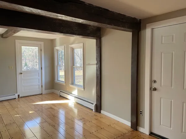 an empty room with windows