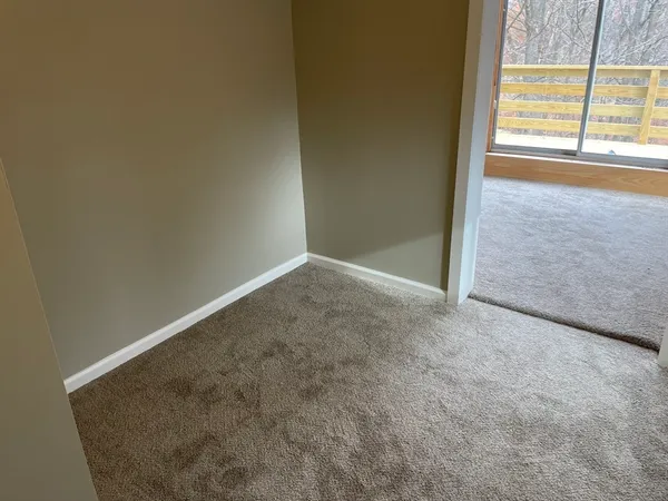 a view of livingroom with furniture and stairs