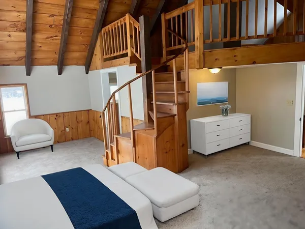 a view of wooden floor and stairs in a room