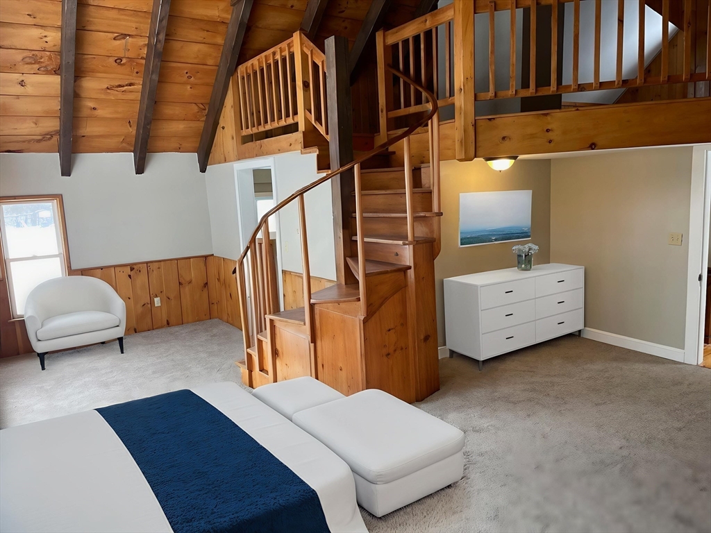 719 Mt Hermon Station Road Northfield, MA 01360 - Photo 24 of 41 a view of livingroom with furniture and stairs