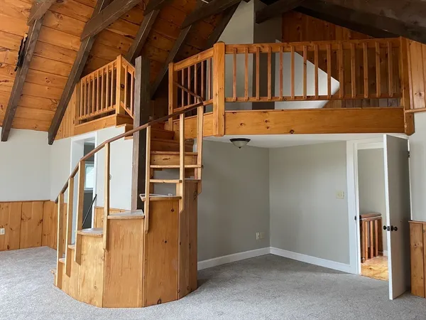 an empty room with a bathroom