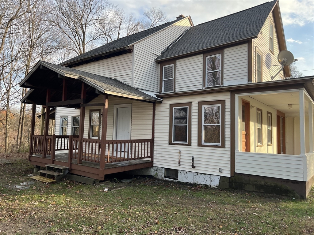 719 Mt Hermon Station Road Northfield, MA 01360 - Photo 35 of 41 a view of a house with a yard and deck