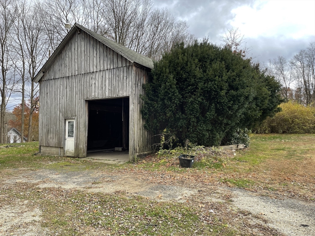 719 Mt Hermon Station Road Northfield, MA 01360 - Photo 39 of 41 a tree is standing in the yard with wooden fence