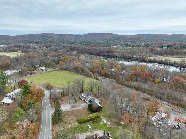 a view of a lake with lots of green space