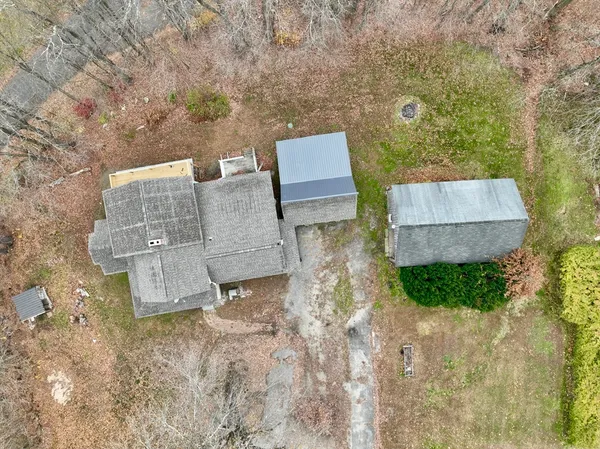 an aerial view of residential house with outdoor space