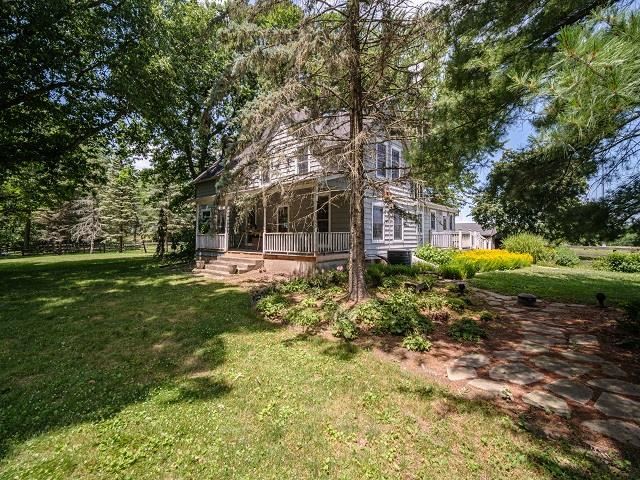 4909 West Edgewood Road Dixon, IL 61021 - Photo 53 of 96 a view of a house with a garden