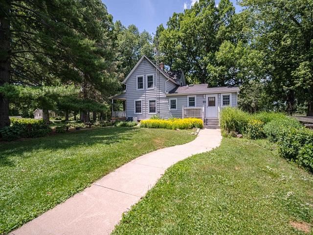 4909 West Edgewood Road Dixon, IL 61021 - Photo 54 of 96 a front view of a house with a yard
