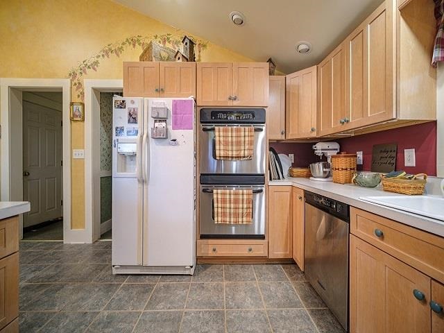4909 West Edgewood Road Dixon, IL 61021 - Photo 59 of 96 a kitchen with stainless steel appliances granite countertop a refrigerator sink and cabinets