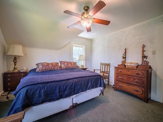 4909 West Edgewood Road Dixon, IL 61021 - Photo 74 of 96 a bedroom with a bed and a chandelier