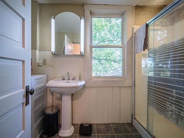 4909 West Edgewood Road Dixon, IL 61021 - Photo 75 of 96 a bathroom with a sink a toilet and a window