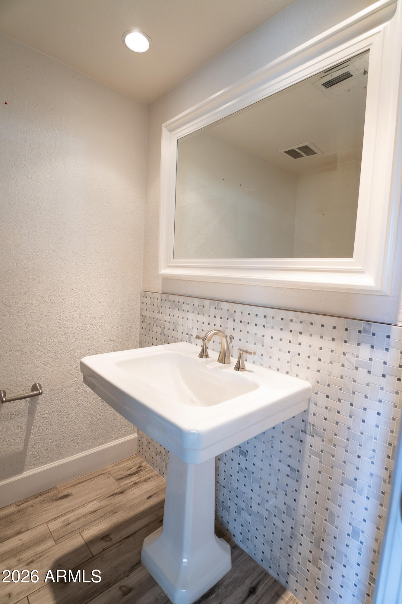 5100 North Miller Road, Unit 3 Scottsdale, AZ 85250 - Photo 13 of 31 a bathroom with a sink and a mirror