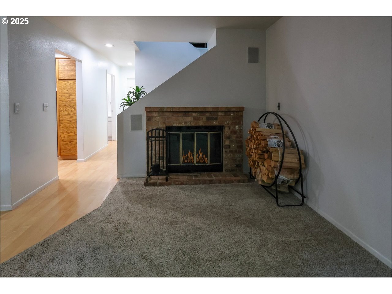 7824 Northeast Loowit Loop, Unit 70 Vancouver, WA 98662 - Photo 11 of 26 a view of an empty room and fire place