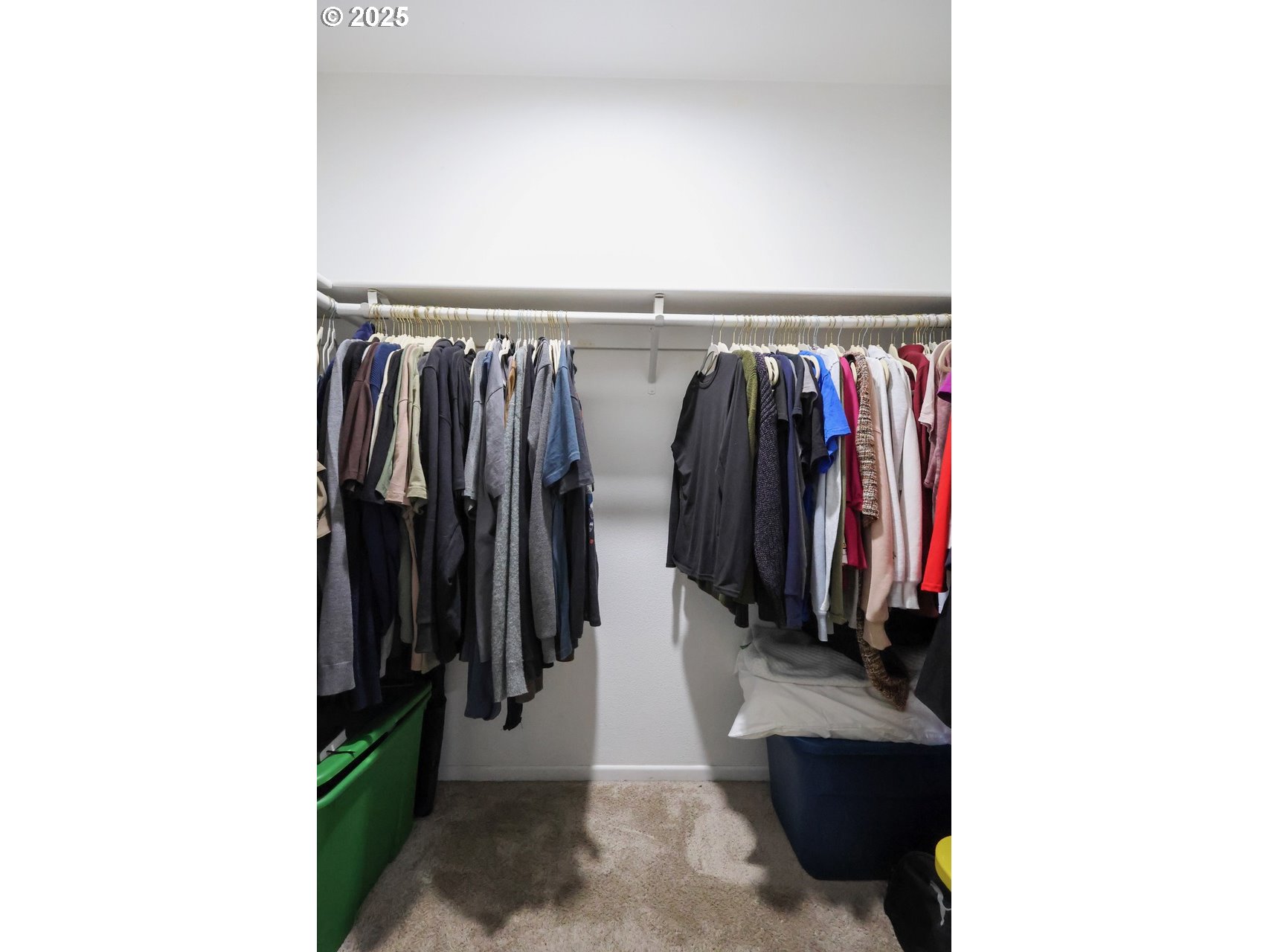 7824 Northeast Loowit Loop, Unit 70 Vancouver, WA 98662 - Photo 16 of 26 a view of walk in closet with clothes and shoes