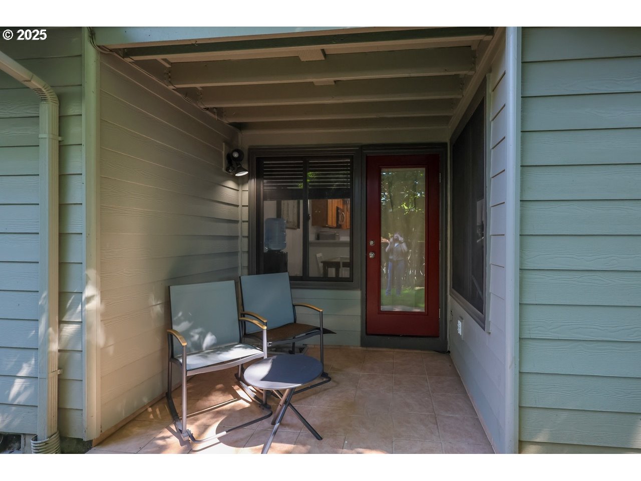 7824 Northeast Loowit Loop, Unit 70 Vancouver, WA 98662 - Photo 21 of 26 a living room with furniture and a window