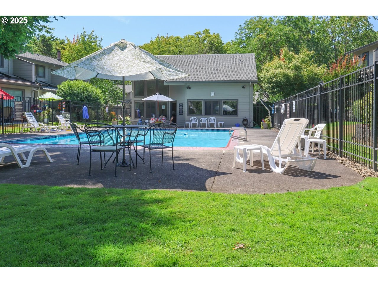 7824 Northeast Loowit Loop, Unit 70 Vancouver, WA 98662 - Photo 25 of 26 a view of a house with backyard sitting area and garden