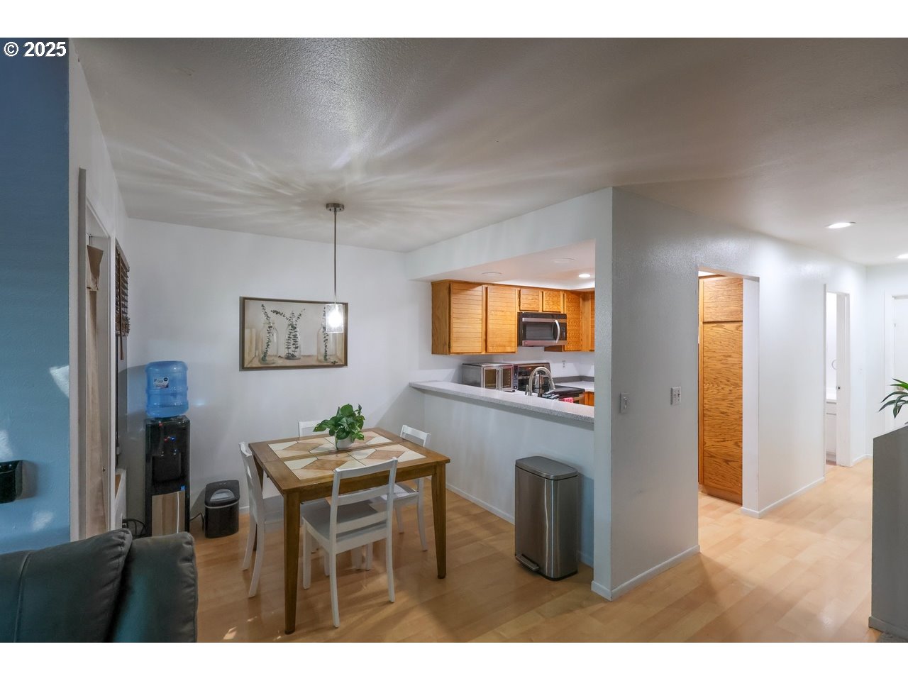 7824 Northeast Loowit Loop, Unit 70 Vancouver, WA 98662 - Photo 8 of 26 a living room with fireplace furniture and a flat screen tv