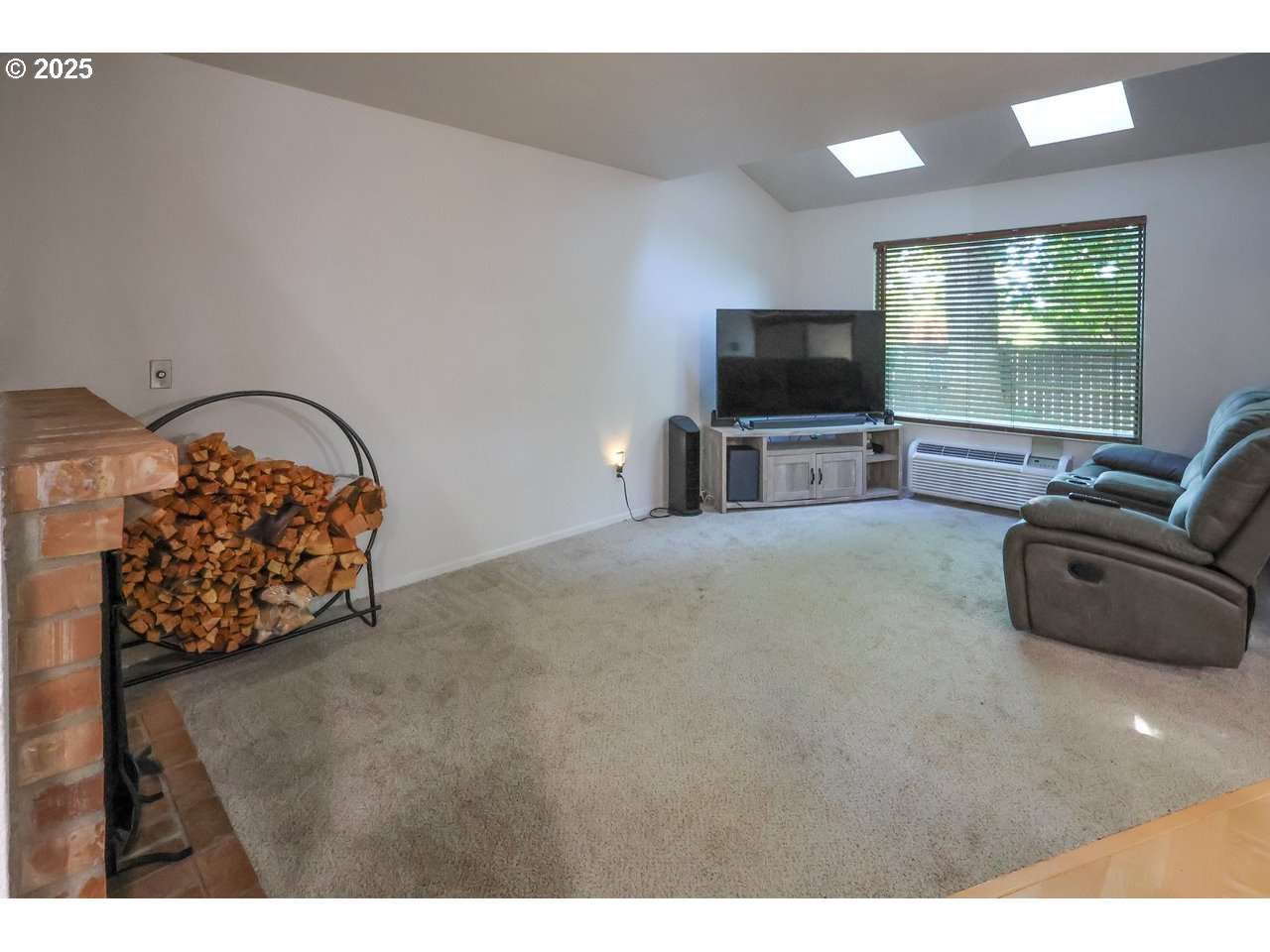 7824 Northeast Loowit Loop, Unit 70 Vancouver, WA 98662 - Photo 10 of 26 a living room with furniture and a flat screen tv