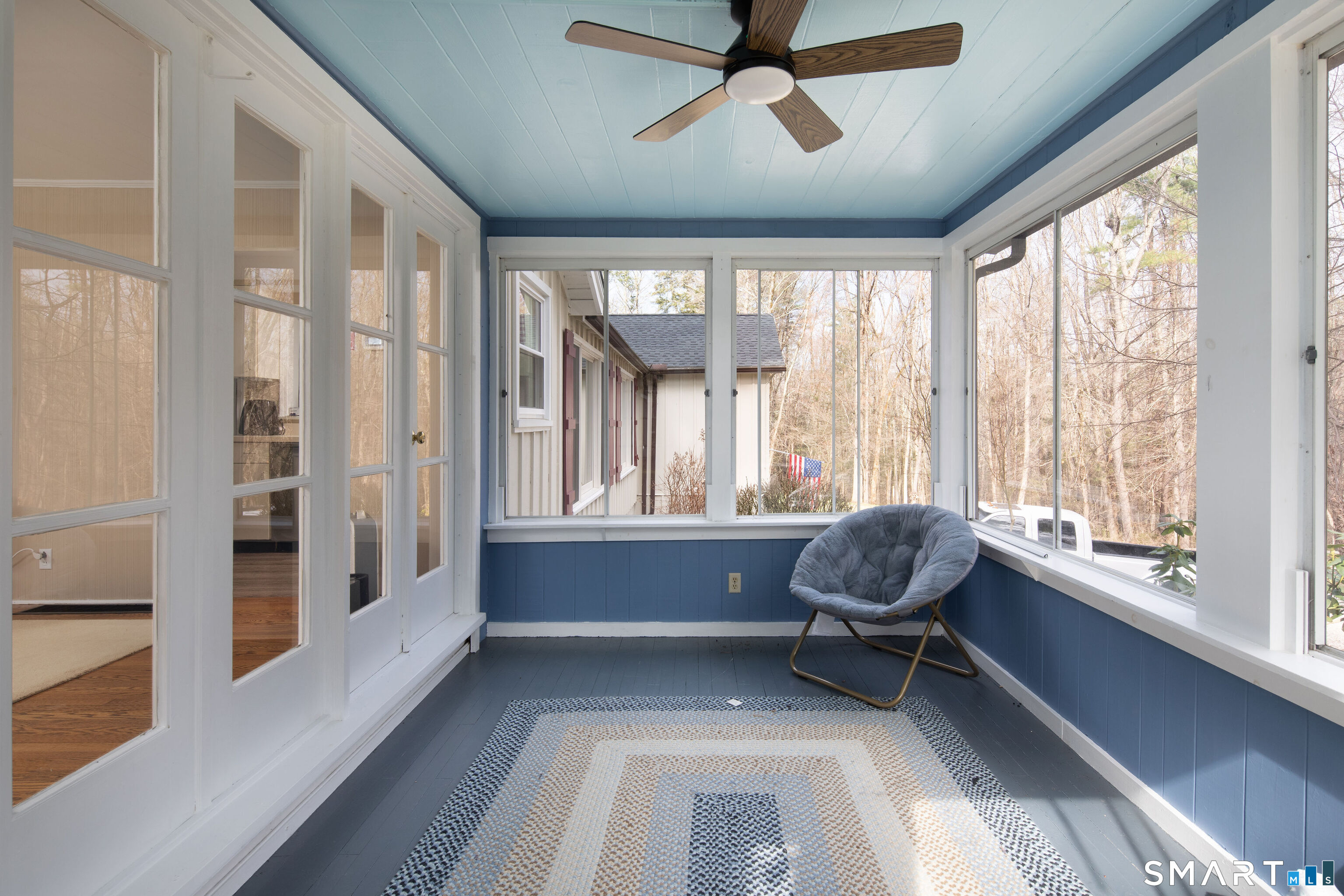 255 Dibble Hill Road Cornwall, CT 06796 - Photo 11 of 30 a living room with furniture and a large window
