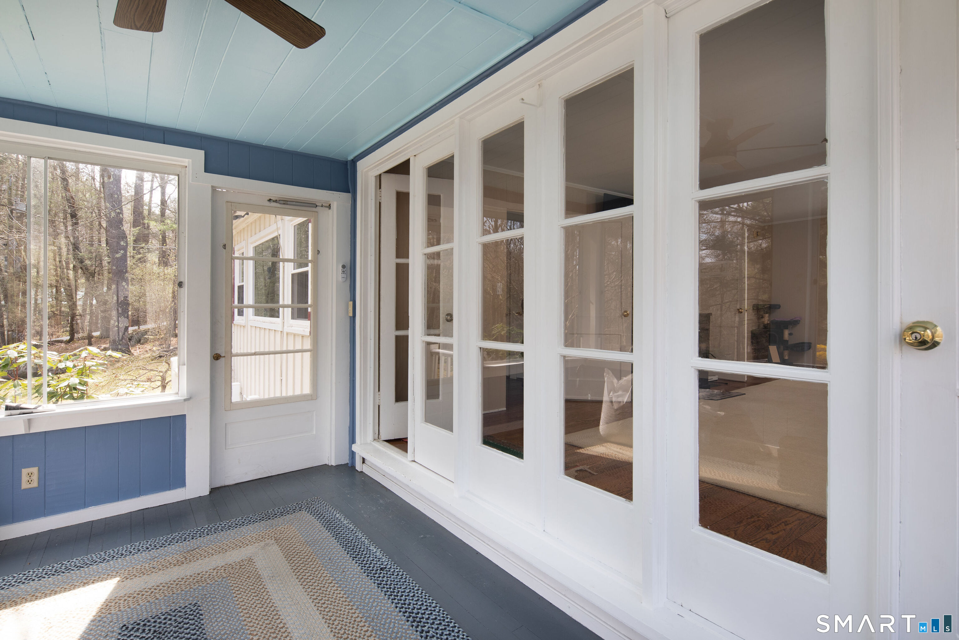 255 Dibble Hill Road Cornwall, CT 06796 - Photo 12 of 30 a view of an entryway with wooden floor and windows