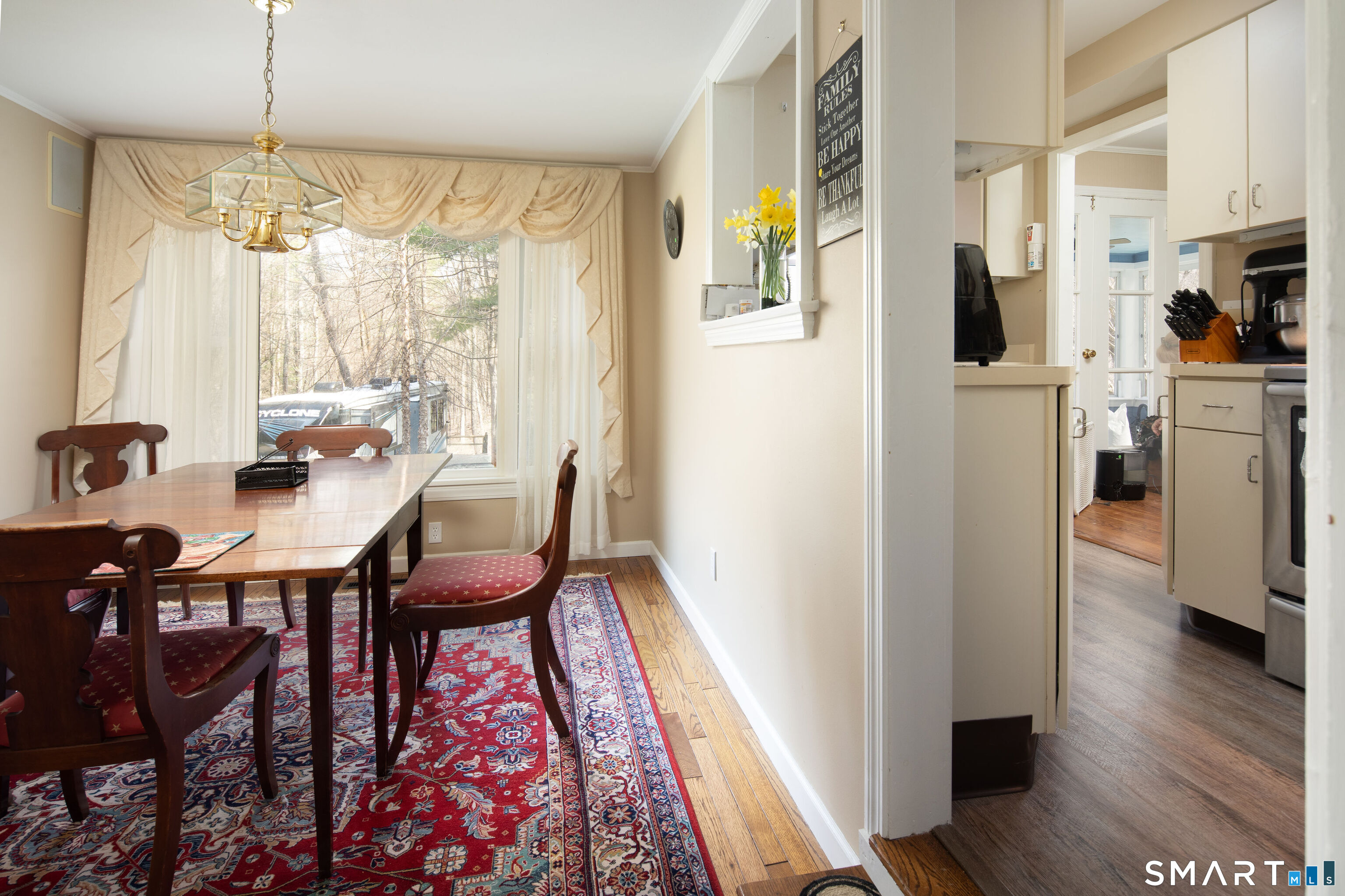 255 Dibble Hill Road Cornwall, CT 06796 - Photo 19 of 30 a view of a dining room with furniture window and wooden floor