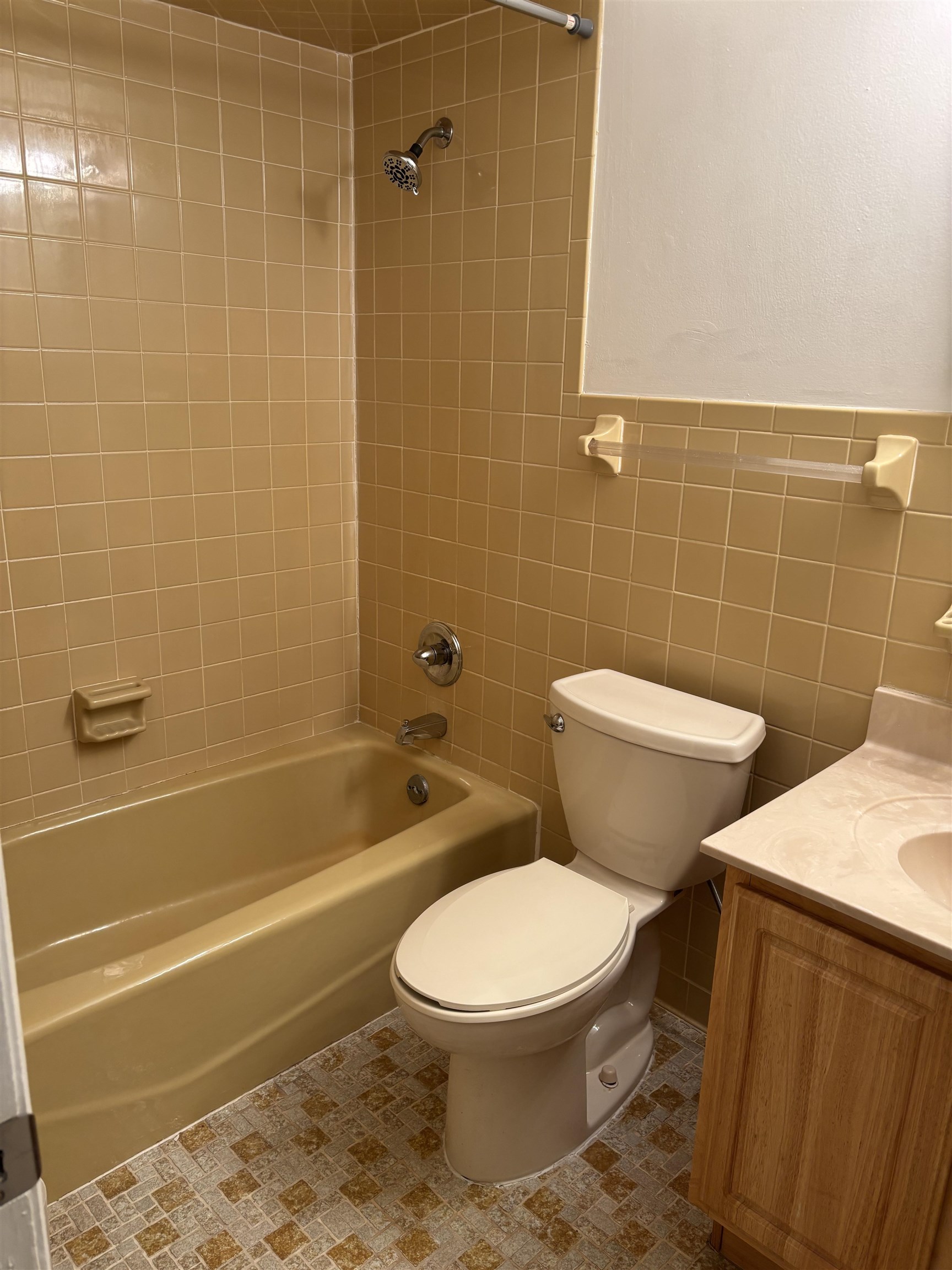 3421 Red Cloud Trail St. Augustine, FL 32086 - Photo 12 of 19 a white toilet and tub sitting next to a bathroom sink