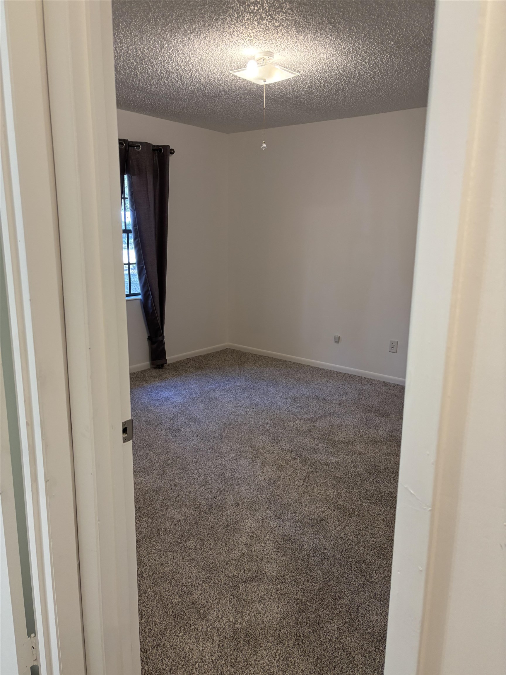 3421 Red Cloud Trail St. Augustine, FL 32086 - Photo 6 of 19 an empty room with an entryway