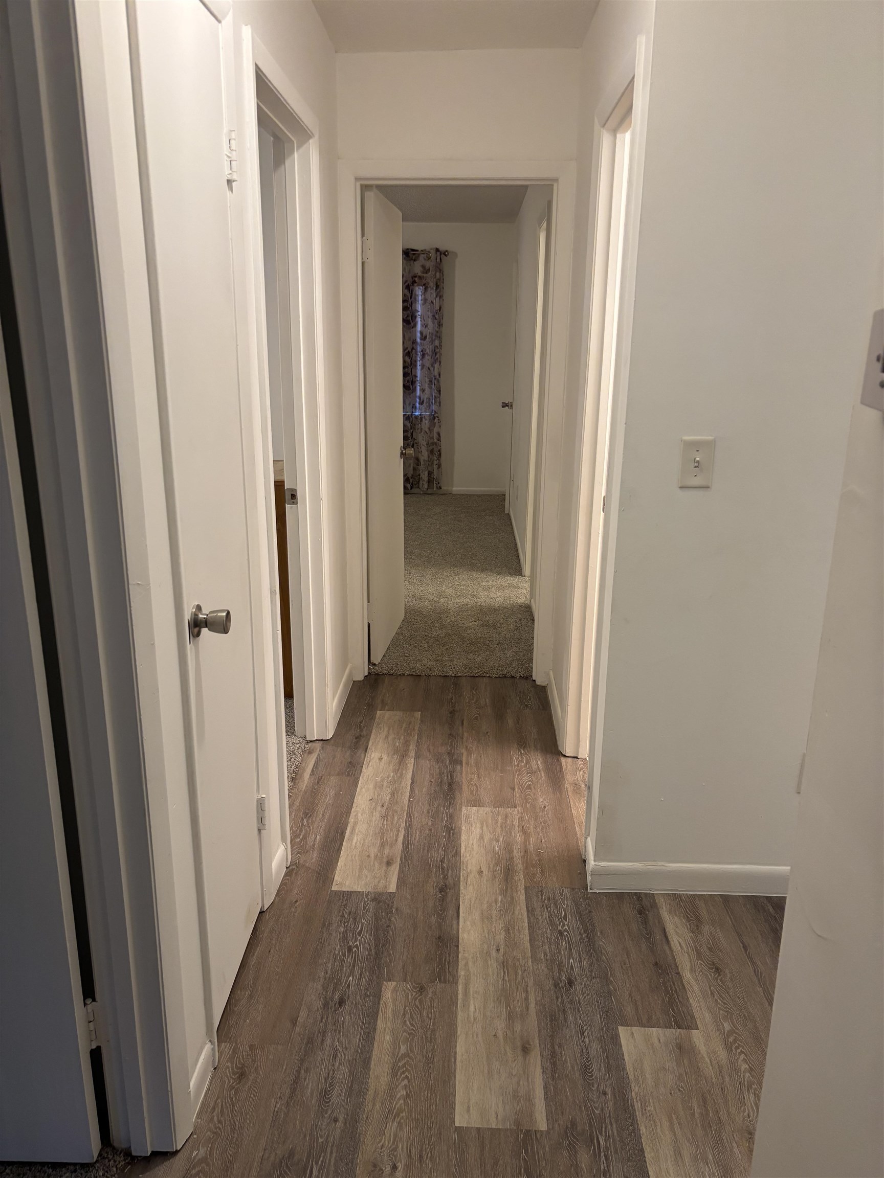 3421 Red Cloud Trail St. Augustine, FL 32086 - Photo 10 of 19 a view of a hallway with wooden floor and staircase