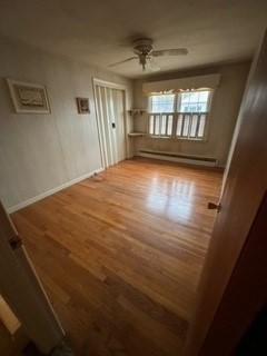 72 Druid Hill Road Springfield, MA 01129 - Photo 6 of 20 a view of an empty room with wooden floor and a window