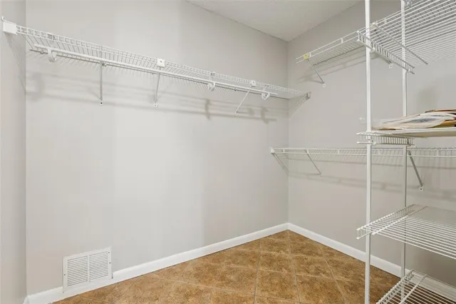 a view of a room with racks on the wall