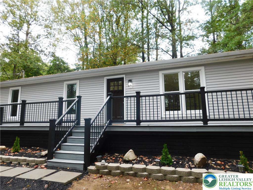 a front view of a house with garage