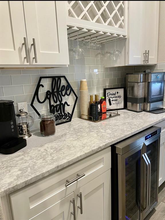3526 Ivandell Avenue Dallas, TX 75211 - Photo 7 of 17 a kitchen with granite countertop a sink a stove and cabinets