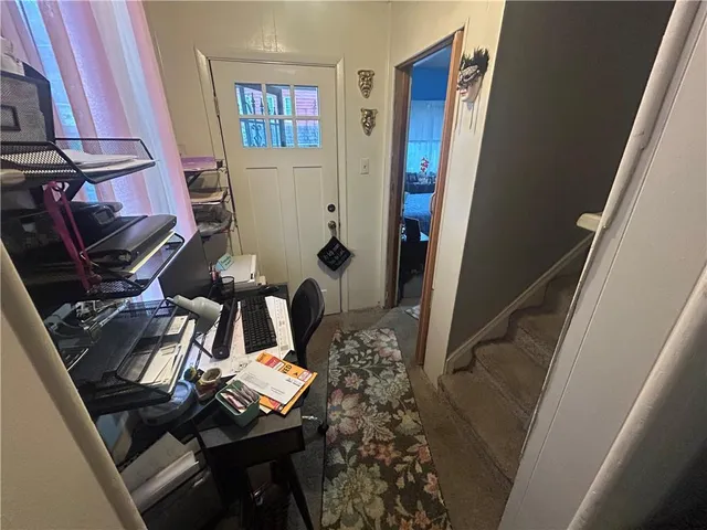 a living room with chairs