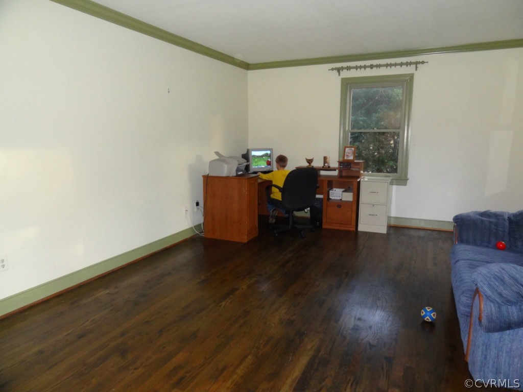 11015 Chalkley Road Chester, VA 23831 - Photo 3 of 6 a living room with furniture and a wooden floor