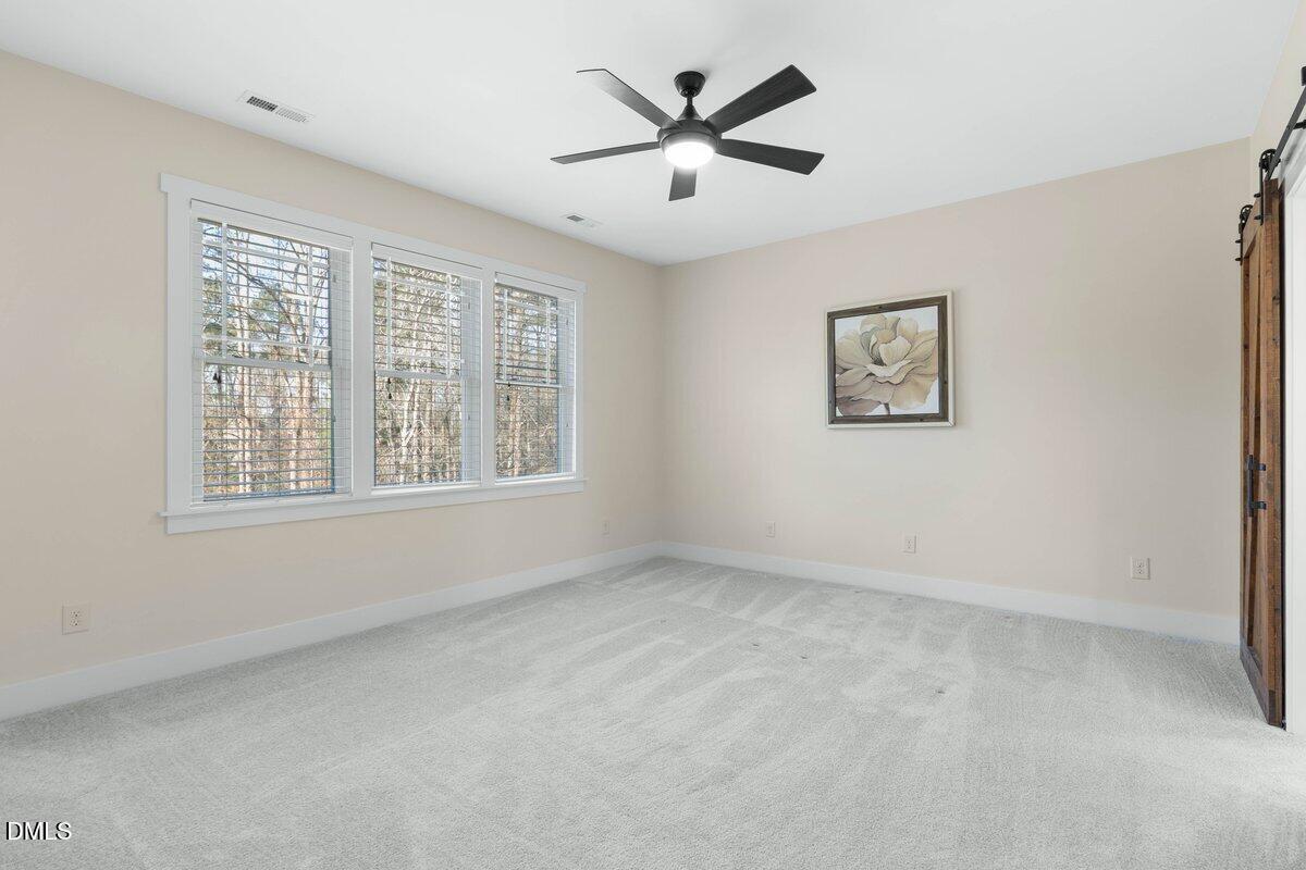 1616 Bowling Road Fuquay-Varina, NC 27526 - Photo 13 of 33 a view of an empty room with a window