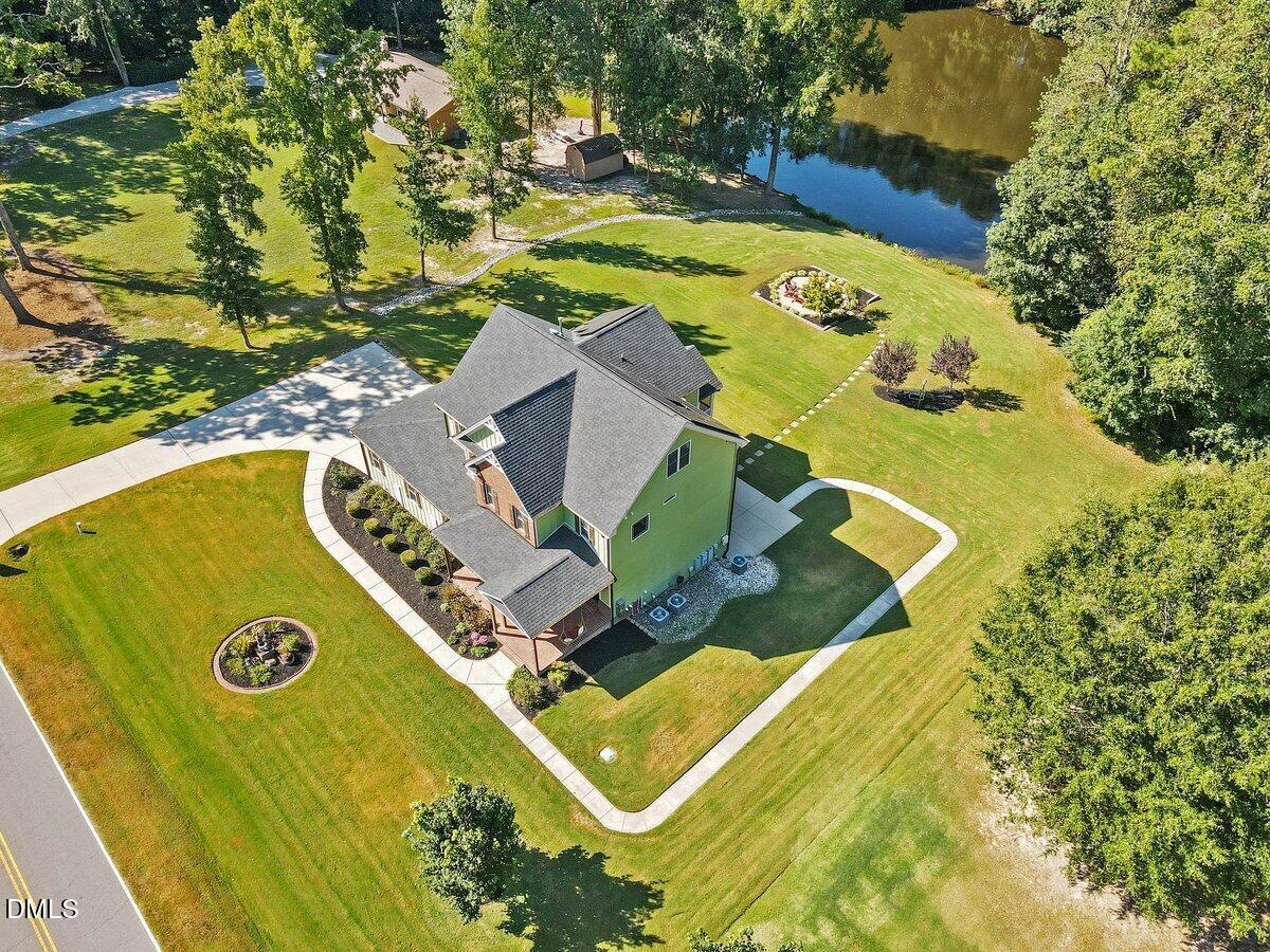 1616 Bowling Road Fuquay-Varina, NC 27526 - Photo 2 of 33 an aerial view of a swimming pool