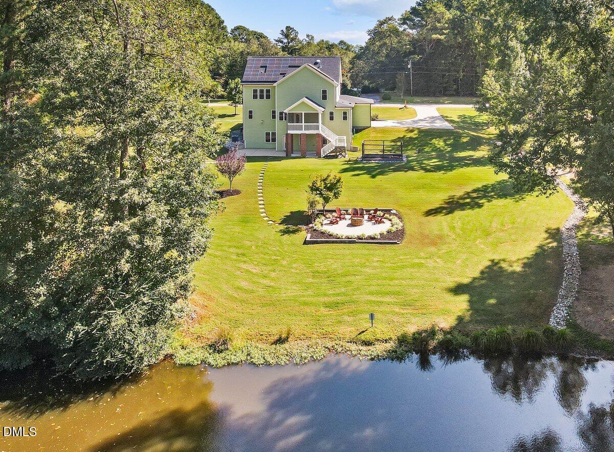 1616 Bowling Road Fuquay-Varina, NC 27526 - Photo 28 of 33 a view of a house with a ocean view