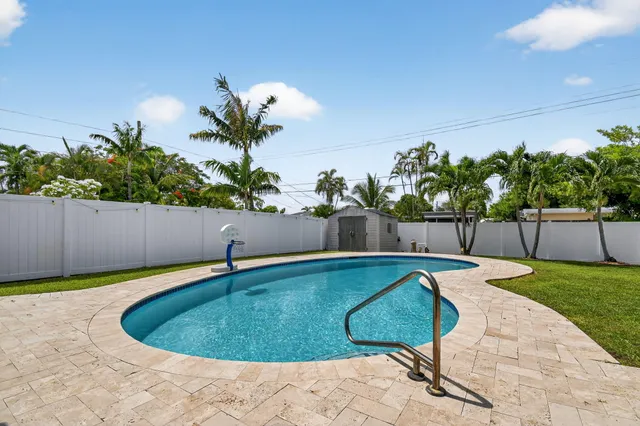 a view of a house with a swimming pool
