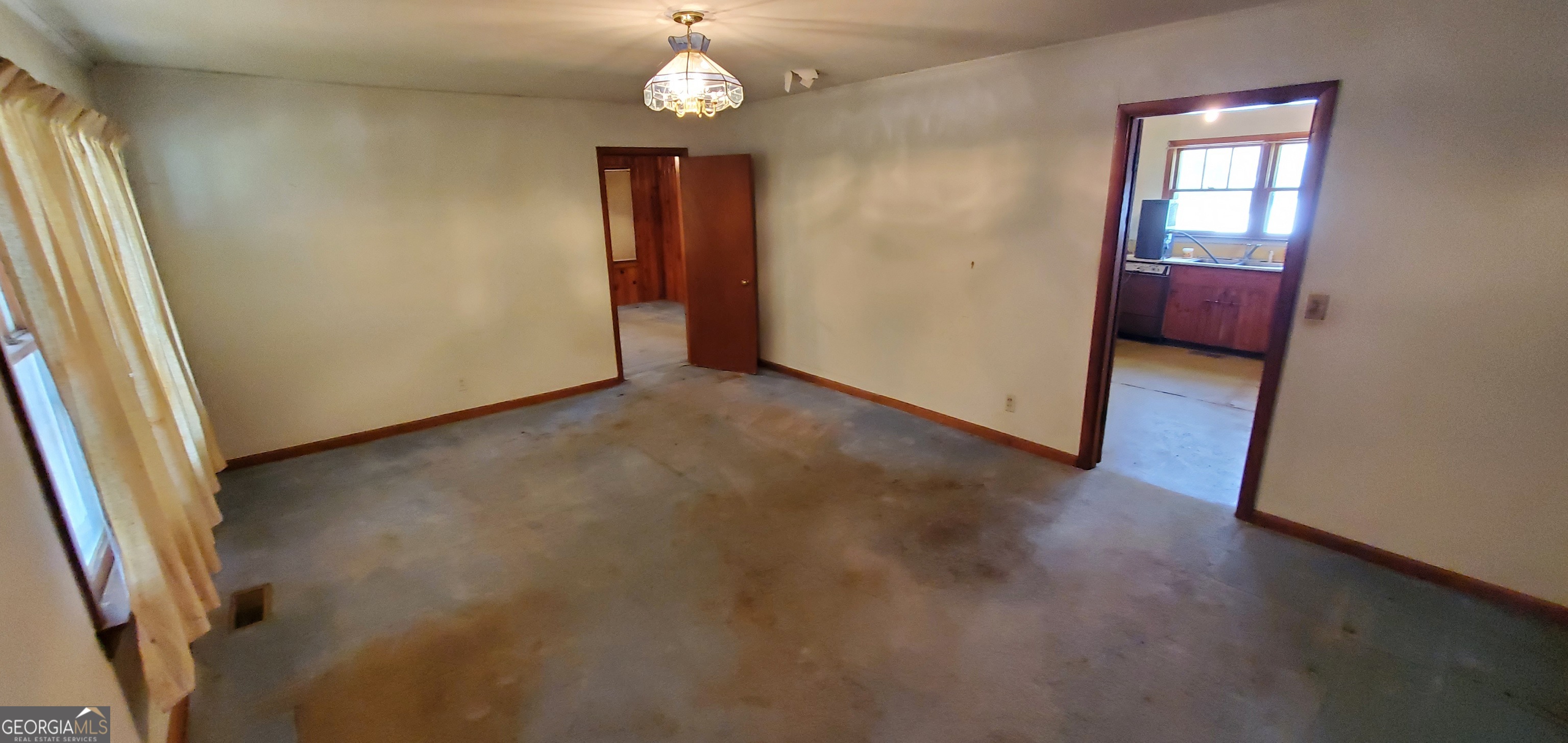 1061 Burger Road Watkinsville, GA 30677 - Photo 41 of 43 an empty room with wooden floor and windows