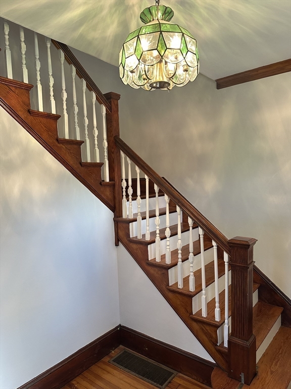36 Jasper Street Saugus, MA 01906 - Photo 12 of 39 a view of entryway with wooden floor