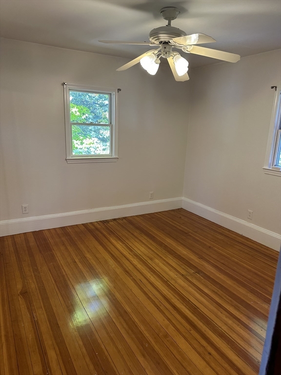 36 Jasper Street Saugus, MA 01906 - Photo 25 of 39 a view of a room with wooden floor and a fan