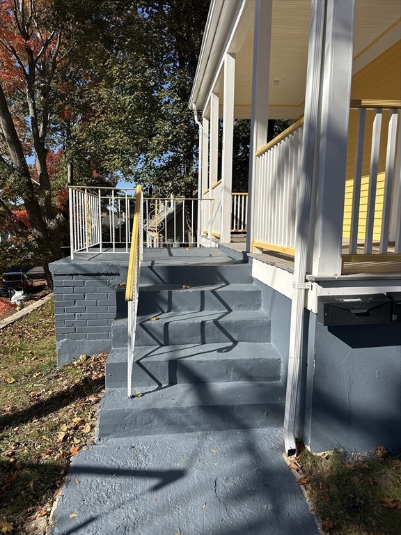 36 Jasper Street Saugus, MA 01906 - Photo 38 of 39 a front view of a house with a yard