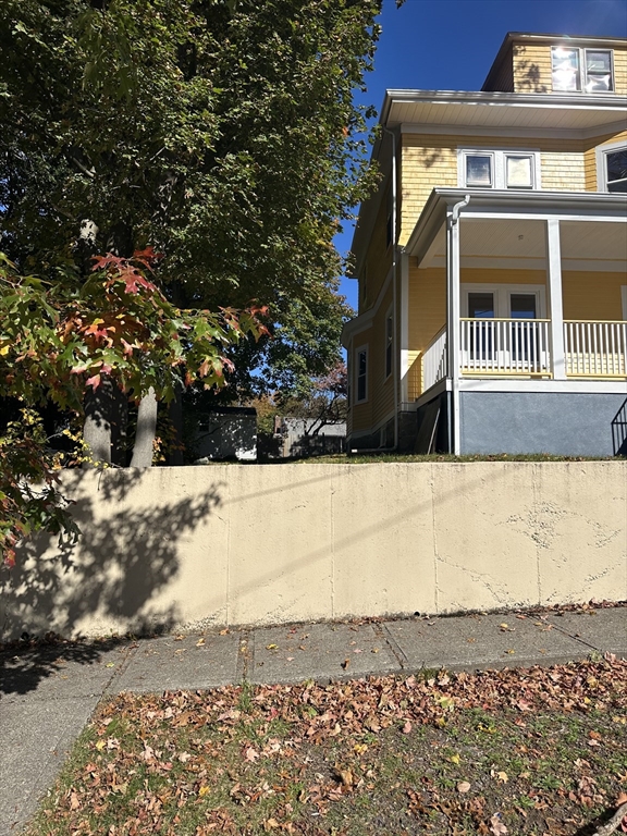 36 Jasper Street Saugus, MA 01906 - Photo 39 of 39 a front view of a house with a yard