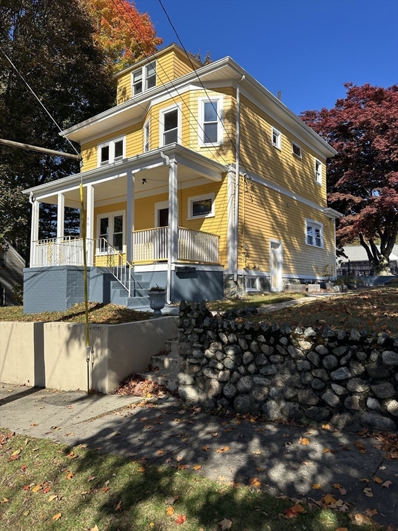 36 Jasper Street Saugus, MA 01906 - Photo 4 of 39 a front view of a house with a yard