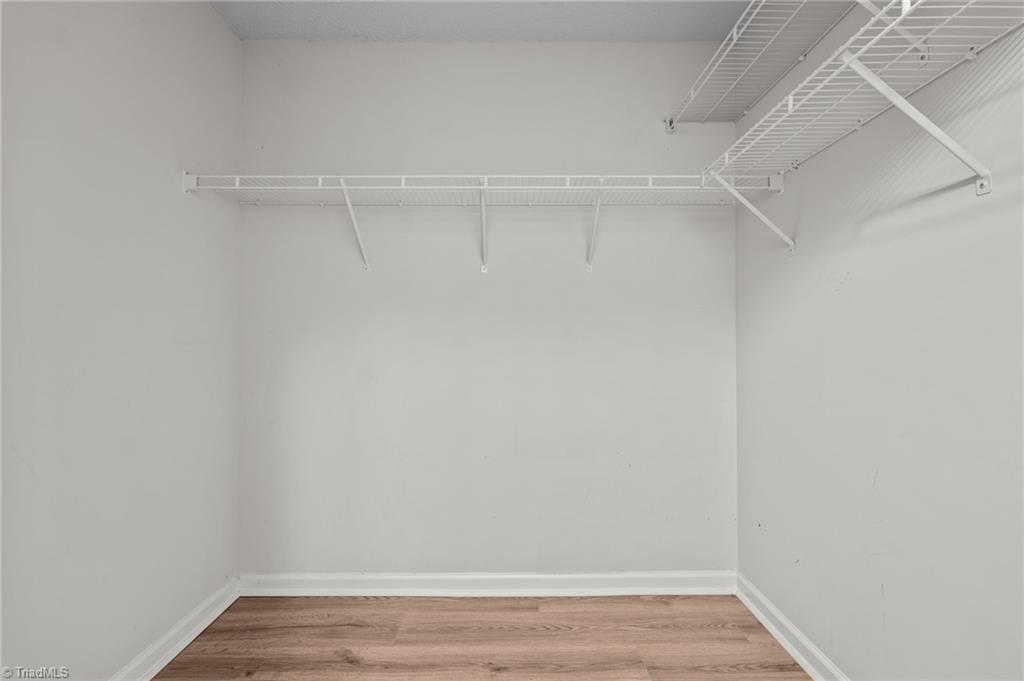 5001 Bass Chapel Road, Unit 3D Greensboro, NC 27455 - Photo 21 of 50 Spacious walk-in closet in Primary suite.
