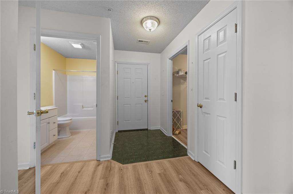 5001 Bass Chapel Road, Unit 3D Greensboro, NC 27455 - Photo 31 of 50 Foyer area of the home.