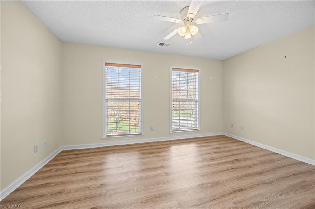 5001 Bass Chapel Road, Unit 3D Greensboro, NC 27455 - Photo 36 of 50 Freshly painted second bedroom of the condo.