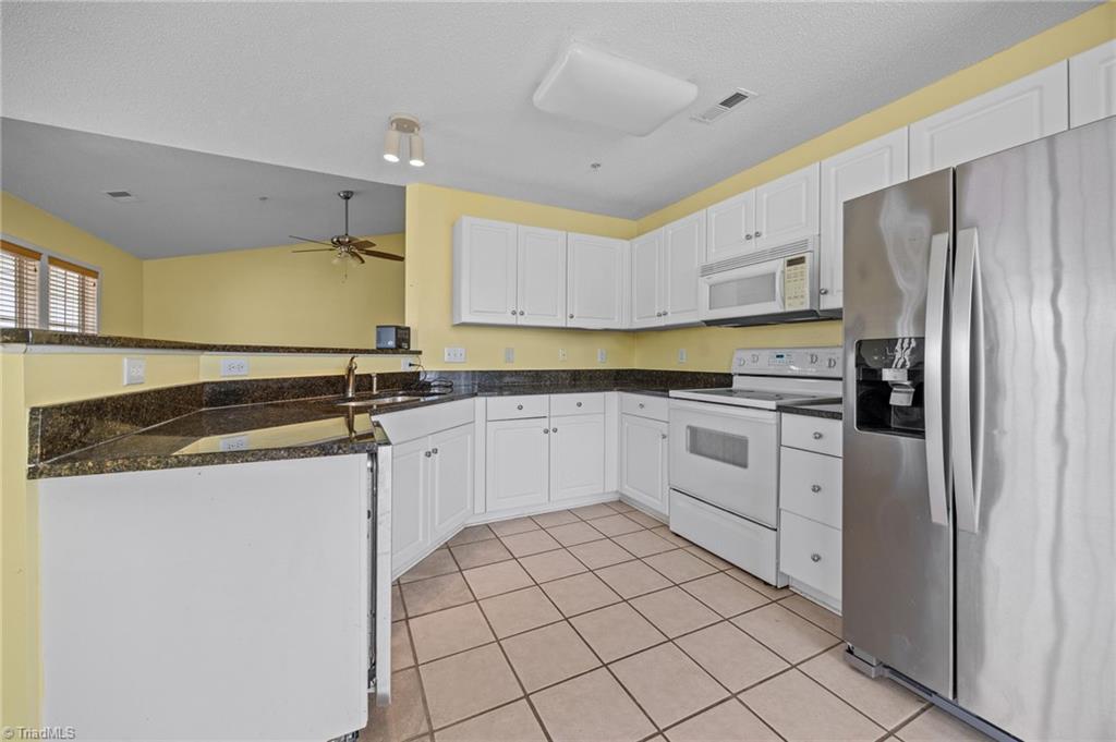 5001 Bass Chapel Road, Unit 3D Greensboro, NC 27455 - Photo 45 of 50 Kitchen with fresh paint.