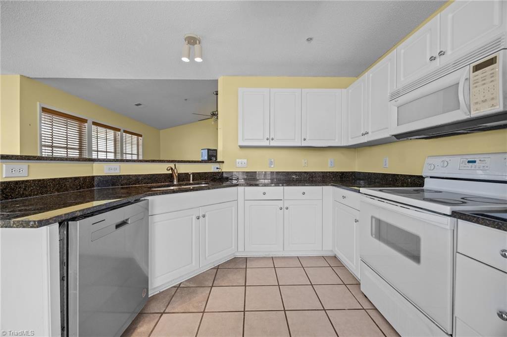 5001 Bass Chapel Road, Unit 3D Greensboro, NC 27455 - Photo 46 of 50 Kitchen with fresh paint.