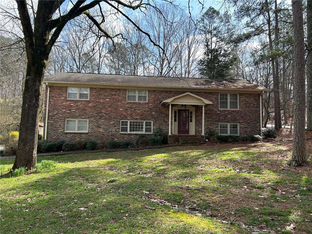 17 Margo Trail Southeast Rome, GA 30161 - Photo 1 of 1 a view of a house with a garden and trees